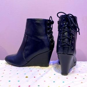 High heel black leather boots,used few times, good condition,heel 3 inches tall.